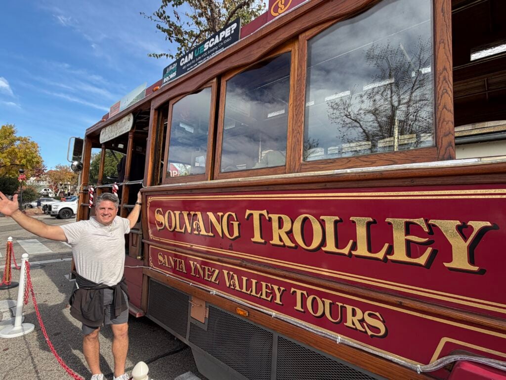 man in front of trolley