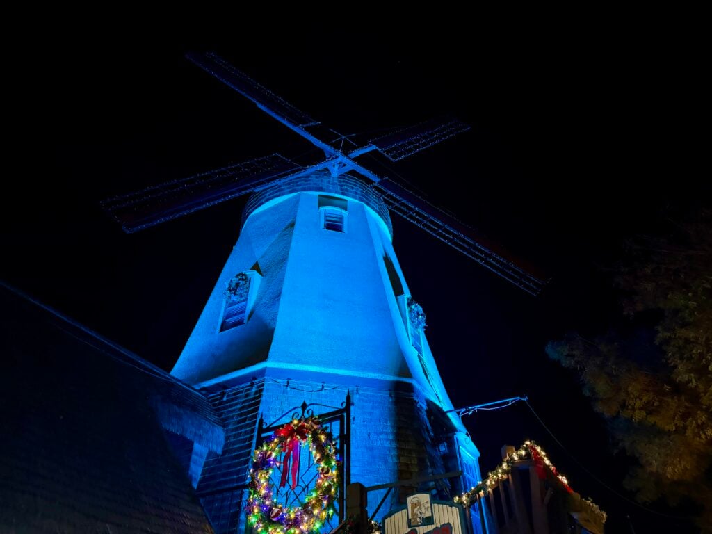 windmill lit up in the dark