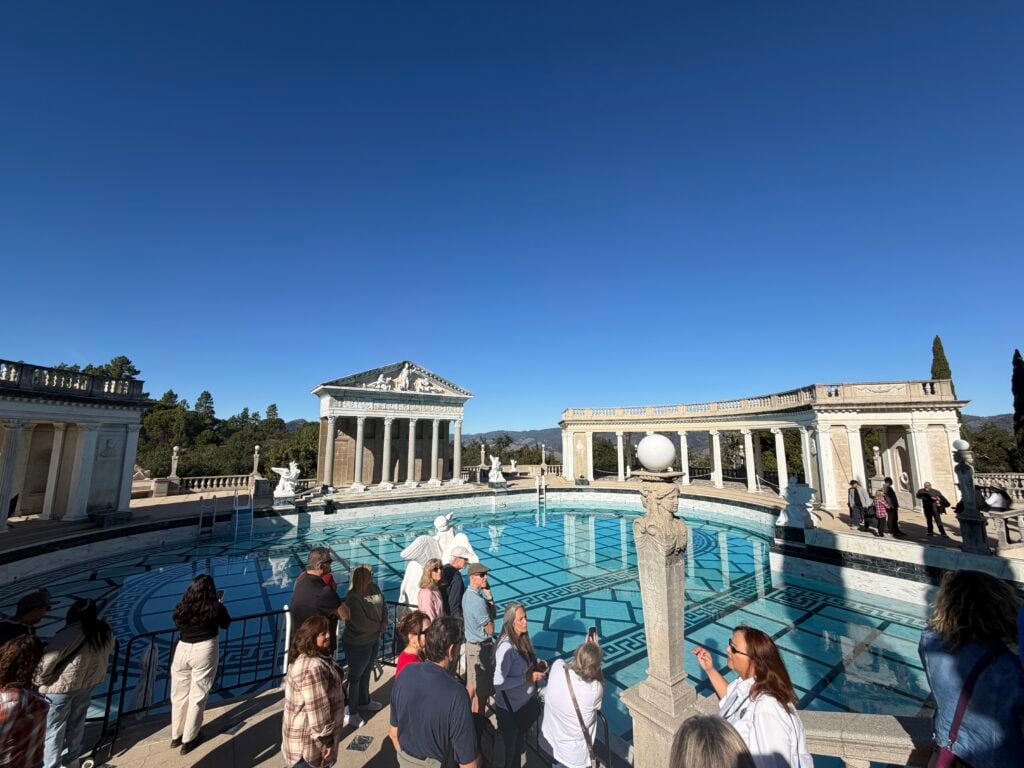 people gathered around swimming pool