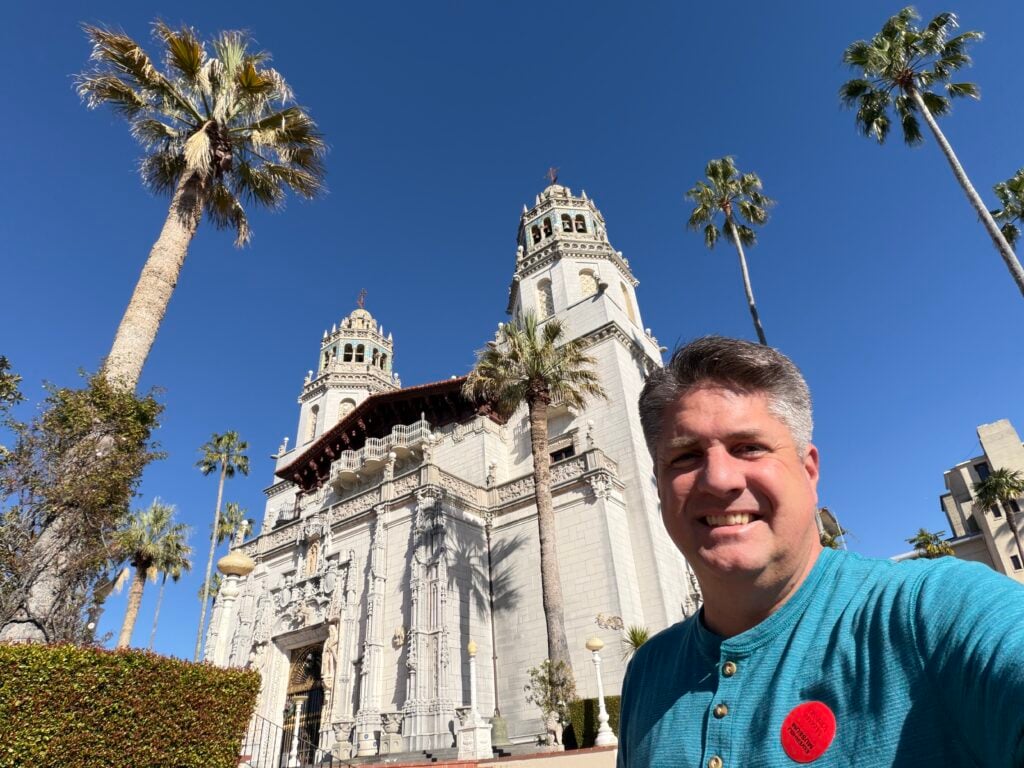 man in front of main building at Hearst Castle