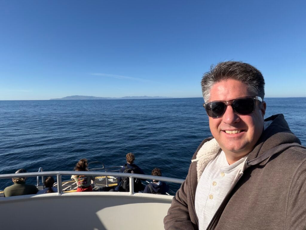 man on boat in ocean