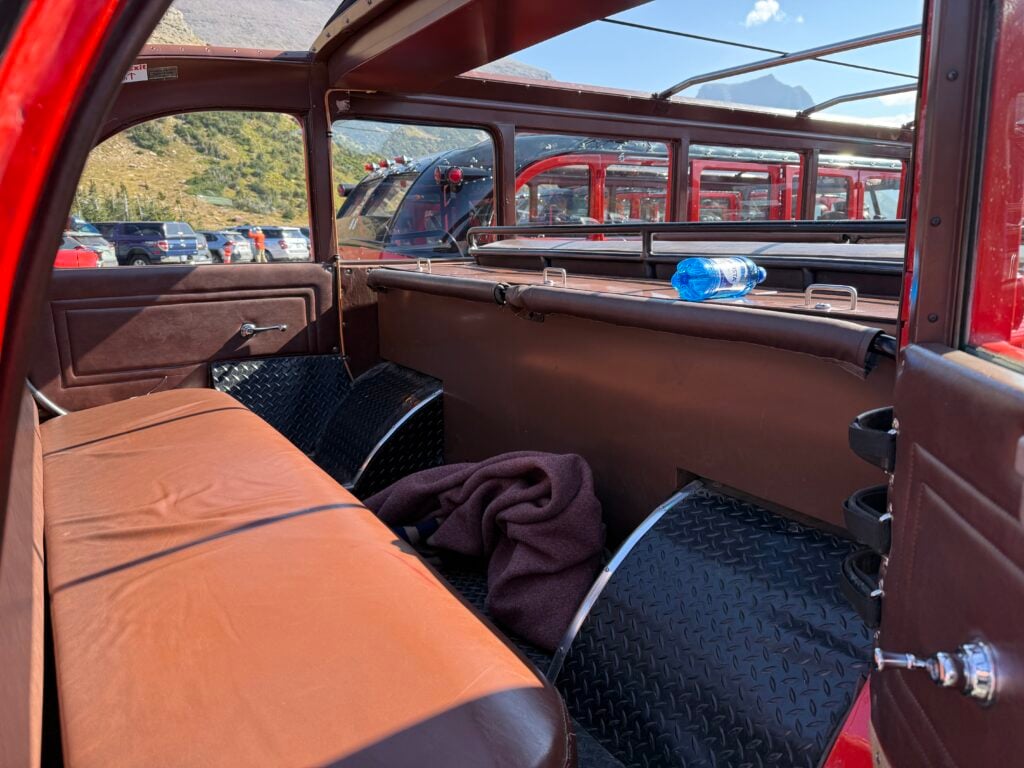 bench seat in red bus in Glacier national park