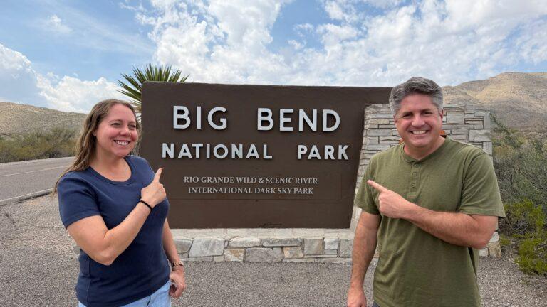 man and woman in front of Big Bend National Park sign