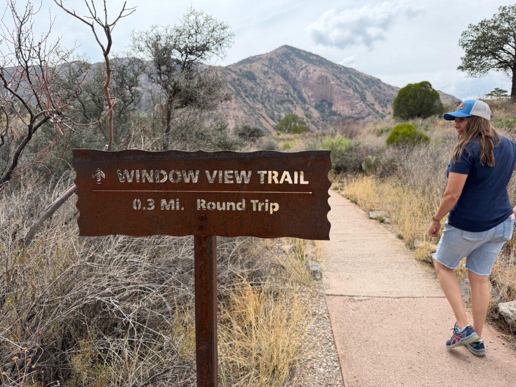 woman walking on paved trail