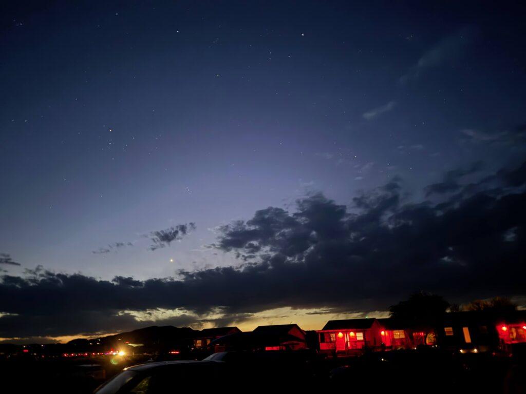 night sky over lighted hotel