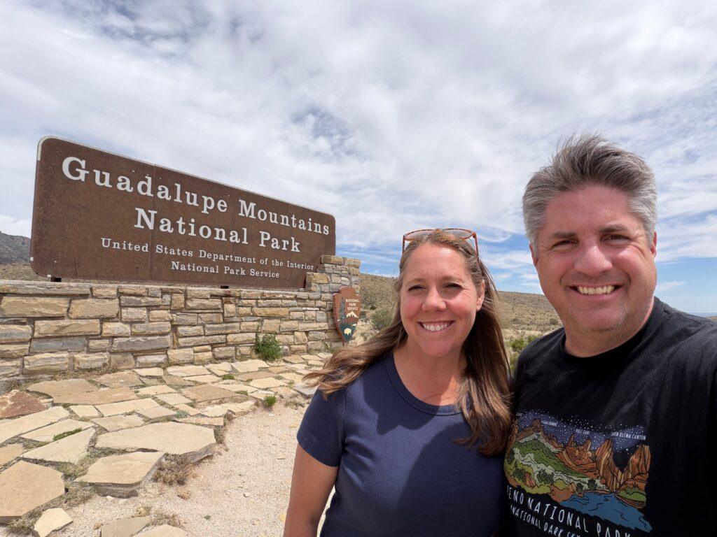 couple standing in front of Guadalupe Mountains National Park