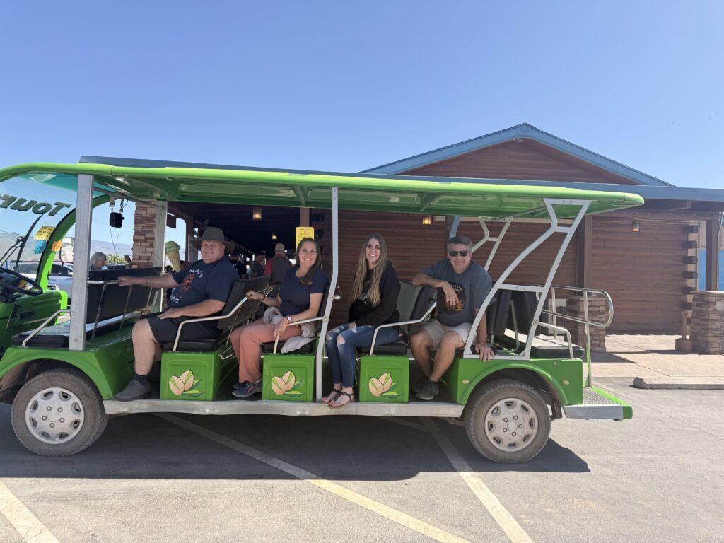 people on open air shuttle
