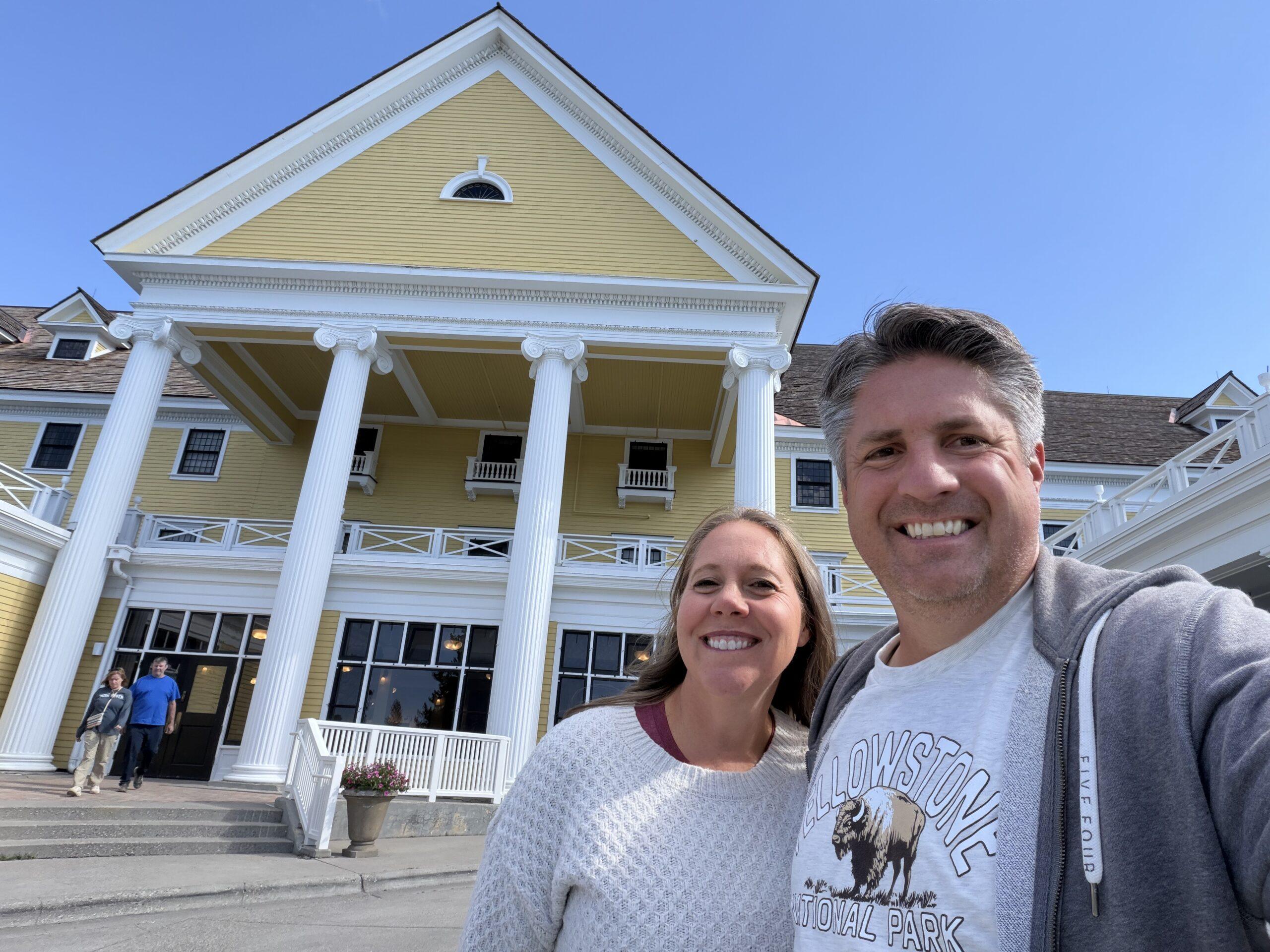 couple standing outside Lake Yellowstone Hotel