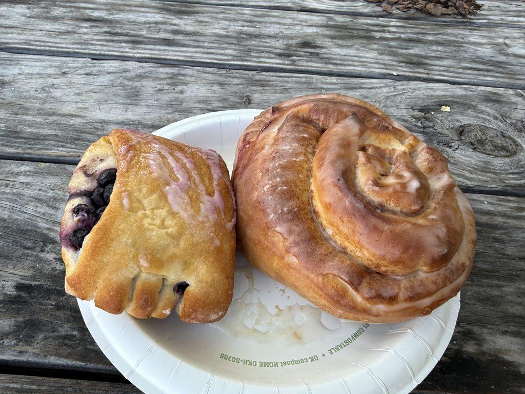 Bear Claw and cinnamon roll on paper plate
