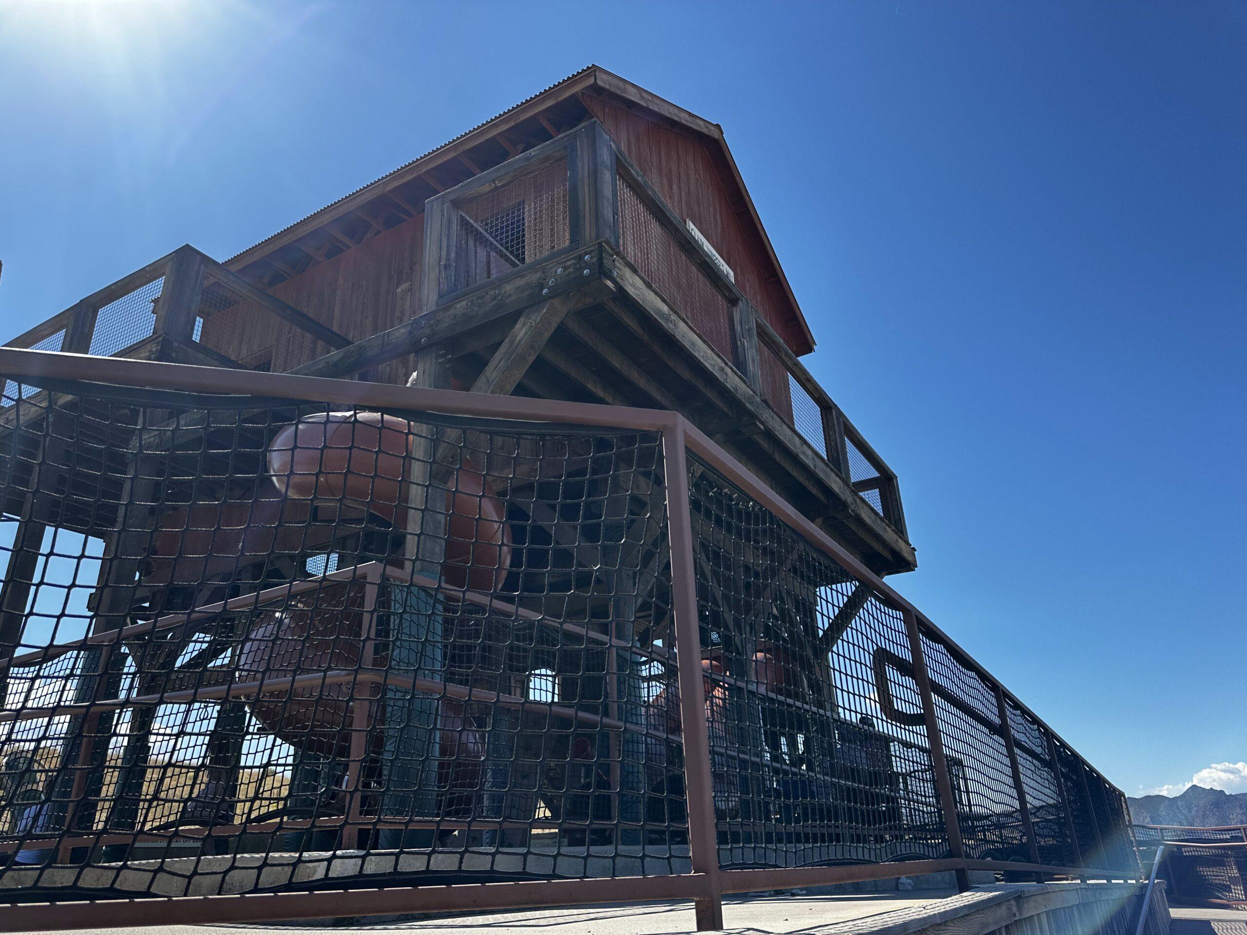 Wooden play structure and enclosed slide at Royal Gorge Bridge and Park