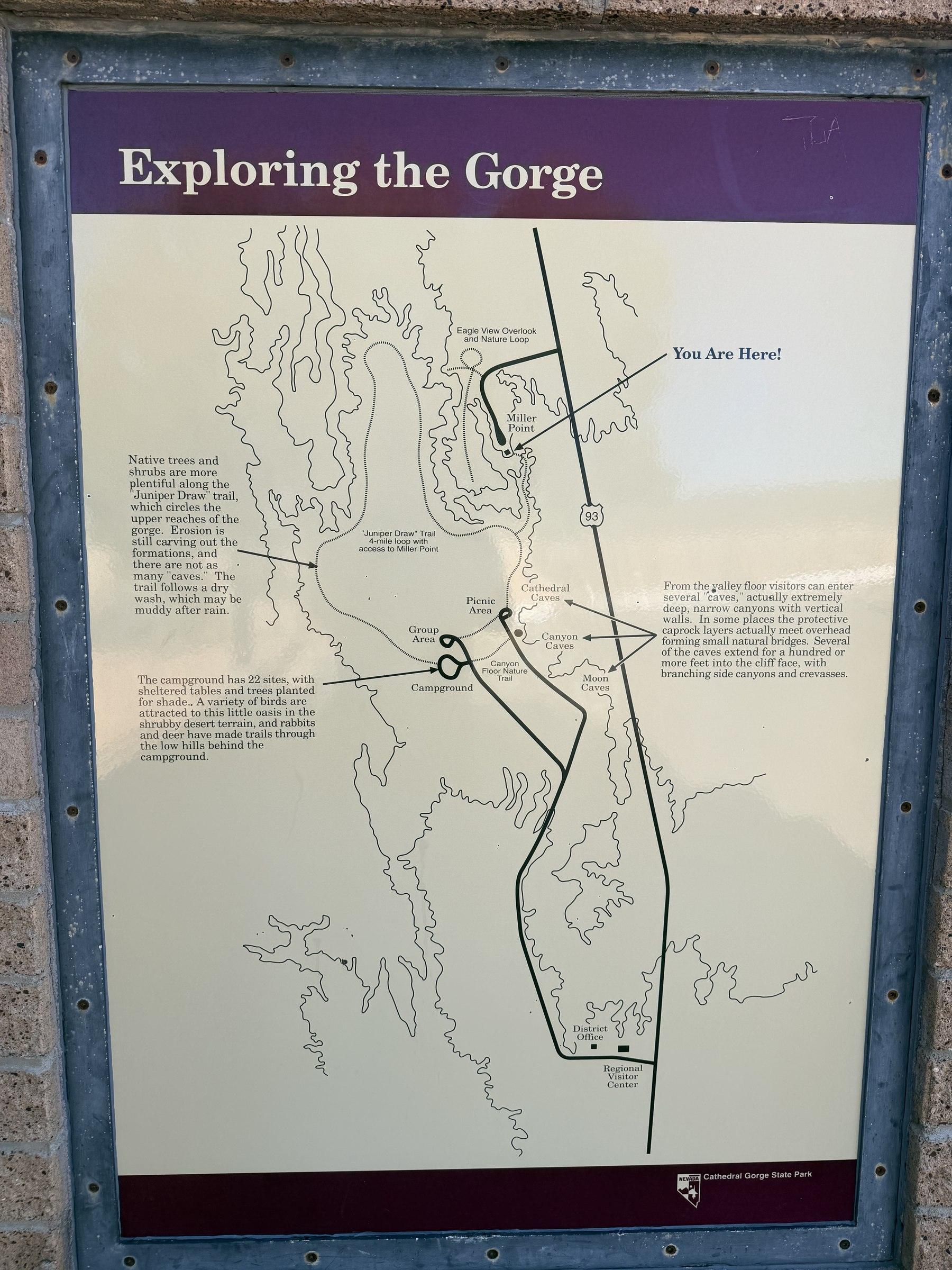 Photographed Cathedral Gorge park sign showing the roads, trails, and visitor facilities.